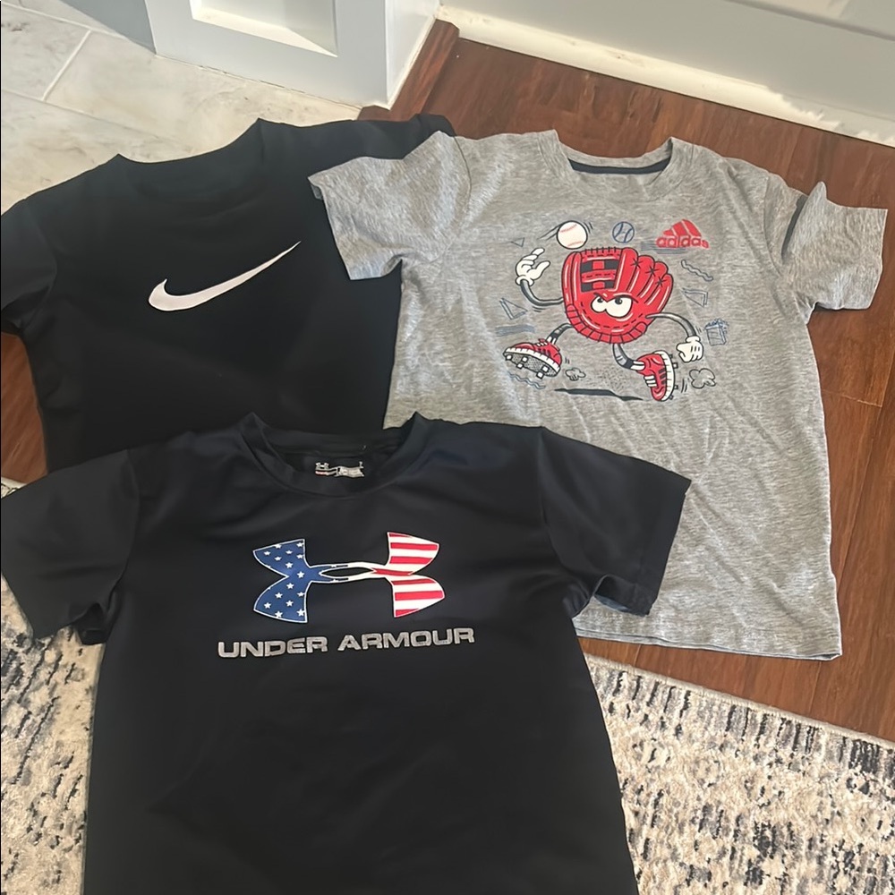 Lot of 3 boys’ short sleeved shirts all size 7: Nike, Adidas, and Under Armour